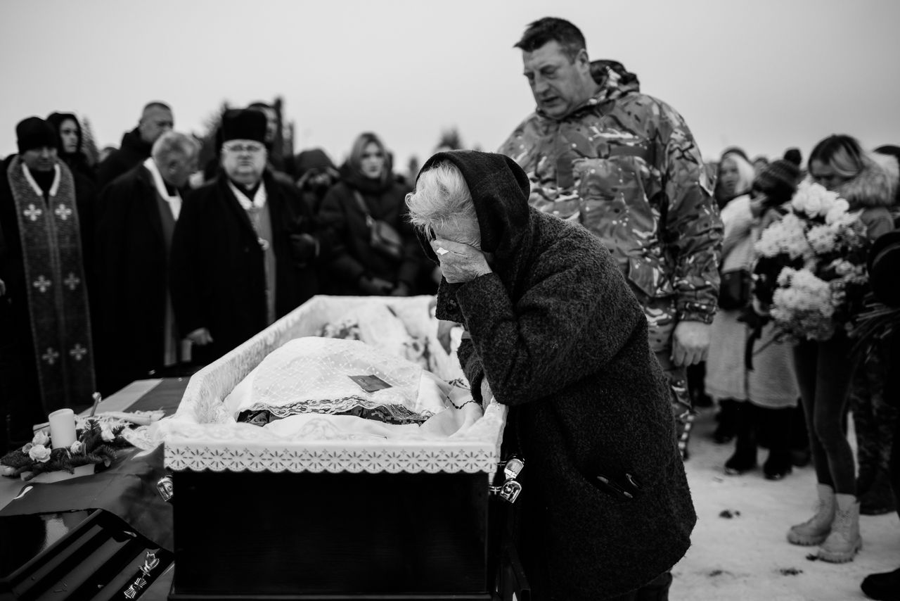 Grandma says goodbye to Mykoła.