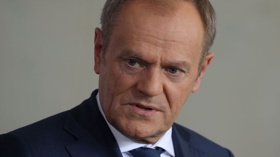 BERLIN, GERMANY - MARCH 15: Polish Prime Minister Donald Tusk speaks to media along with German Chancellor Olaf Scholz and French President Emmanuel Macron (both not pictured) following talks in the "Weimar Triangle" format at the Chancellery on March 15, 2024 in Berlin, Germany. The three leaders announced a variety of concrete measures to assist Ukraine, including buying munitions for Ukraine on international markets and using profits from frozen Russian assets to fund purchases of arms. The "Weimar Triangle" is an effort originally launched by the three nations in 1991 with the aim of furthering European cohesion. (Photo by Sean Gallup/Getty Images)
