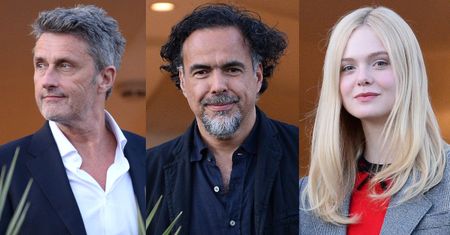 Szarmancki Paweł Pawlikowski dowcipkuje z Elle Fanning podczas spotkania jury festiwalu Cannes