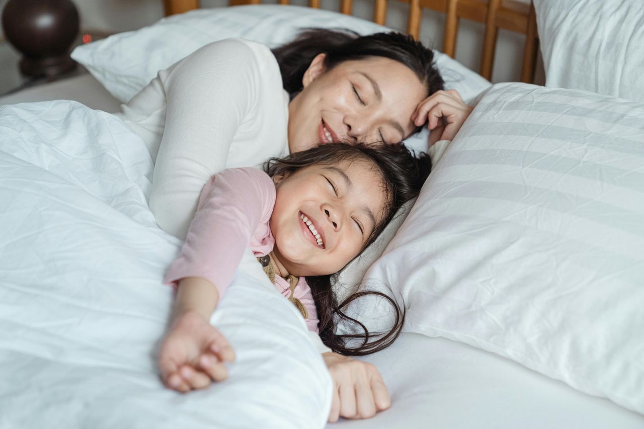Is there an age limit up to which one can sleep with a child for it to be beneficial for their emotional development?