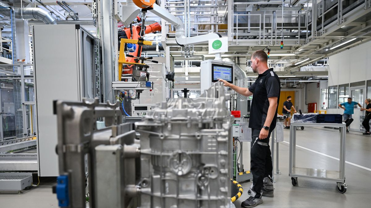 STUTTGART, GERMANY - JUNE 30: A worker assembles electric drive units for its CLA class electric vehicles at the Mercedes-Benz Untertuerkheim plant on June 30, 2025 in Stuttgart, Germany. (Photo by Florian Wiegand/Getty Images)