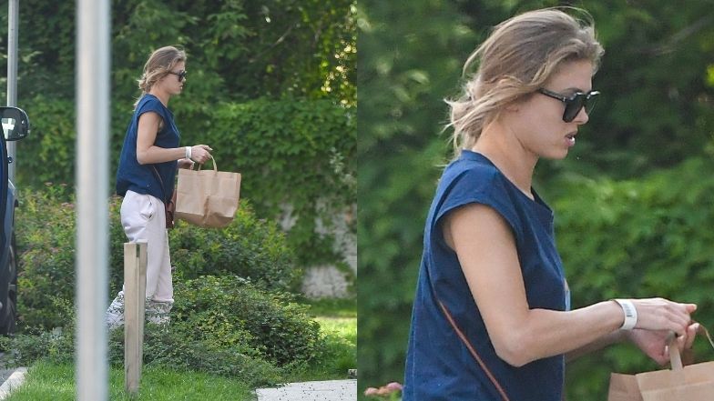 Joanna Opozda i Antek Królikowski na mieście z psem