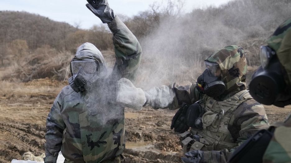 Temporary
U.S. soldiers try to remove the mock chemical pollutants during a joint military drill between South Korea and the United States in Paju, South Korea, Thursday, March 16, 2023. North Korea test-launched an intercontinental ballistic missile Thursday just hours before the leaders of South Korea and Japan were to meet at a Tokyo summit expected to be overshadowed by North Korean nuclear threats. The North's first ICBM test in a month and third weapons tests this week also comes as South Korean and U.S. troops continue joint military exercises that Pyongyang considers a rehearsal to invade. (AP Photo/Lee Jin-man)
Lee Jin-man