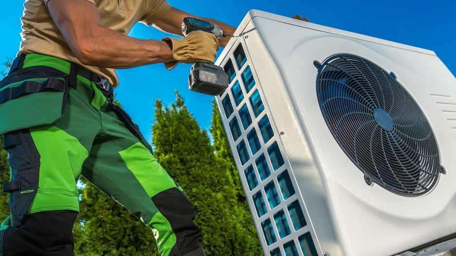 Caucasian Professional HVAC Technician Installing Large Heat Pump in a Backyard. Modern House Heating and Cooling Systems.
heat pump, technician, hvac, worker, job, technology, cooling, cool, heater, drill driver, tool, installer, heating, efficiency, performance, cyrculation, absorbing, absorb, modern, recreation, professional, profession, male, men