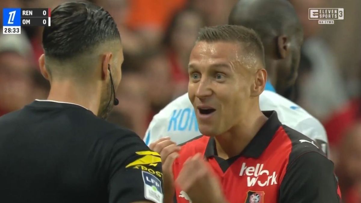 Twitter / ELEVENSPORTSPL / Na zdjęciu: Przemysław Frankowski i sędzia meczu Stade Rennais - Olympique Marsylia