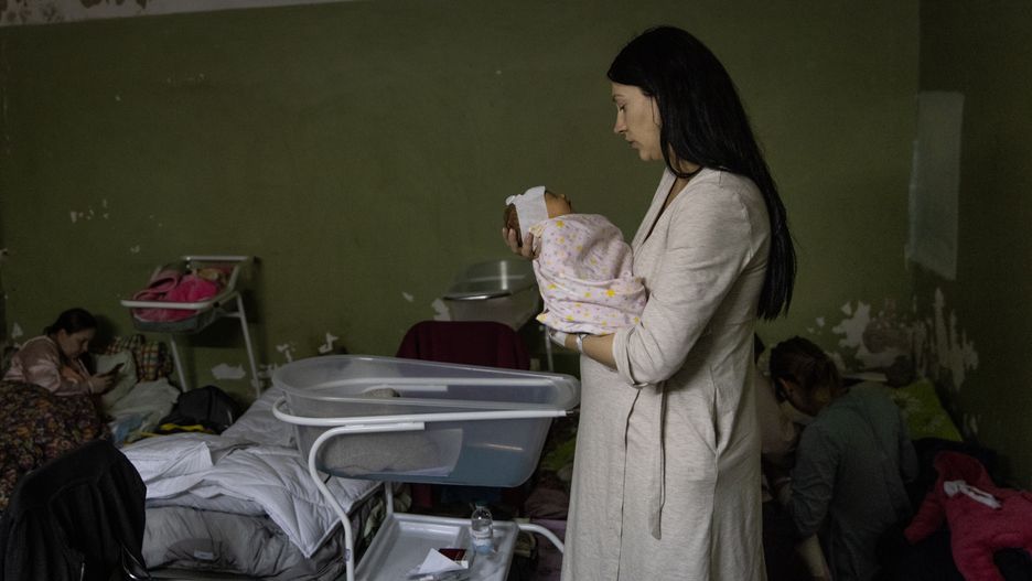 Maternity Ward Patients In Kyiv Hospital Move To Bomb Shelter Amid Russian AttackKYIV, UKRAINE - MARCH 02: A mother holds her newborn baby in the bomb shelter of a maternity hospital on March 02, 2022 in Kyiv, Ukraine.  Russian forces continued their advance on the Ukrainian capital for the seventh day as the country's invasion of its western neighbour goes on. Intense battles are also being waged over Ukraine's other major cities. (Photo by Chris McGrath/Getty Images)Chris McGrathbestof, topix