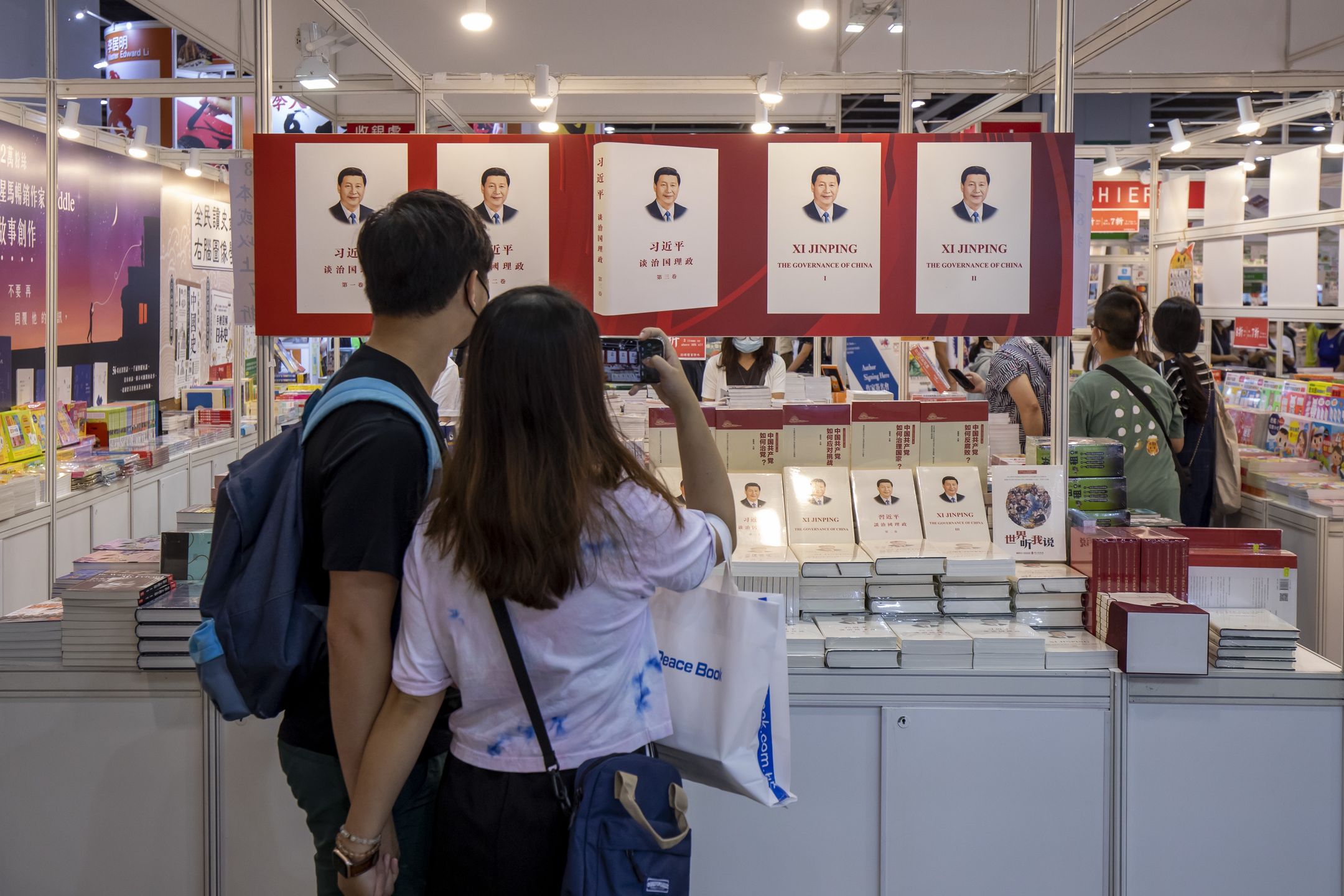 Opening Day of the Hong Kong Book FairCopies of Chinese President Xi Jinping's The Governance of China displayed for sale at the Hong Kong Book Fair in Hong Kong, China, on Wednesday, July 14, 2021. The book fair runs through July 20. Photographer: Paul Yeung/Bloomberg via Getty ImagesBloombergchinese, arts, best photo, books, culture, best photos, east asian, book fairs, publishing, media