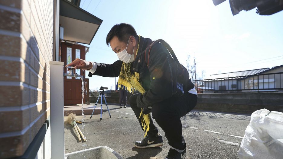 Temporary"Preparatory staying" for the return of residents begins in Futaba Town, Fukushima Prefecture, where the evacuation of the entire town due to the TEPCO Fukushima Daiichi Nuclear Power Plant accident on January 20, 2022. Among the difficult-to-return areas, residents will be able to stay at night at their homes for the first time for 10 years and 10 months aiming to lift the evacuation order after June. Some residents visit their houses to check the electricity and waterworks. ( The Yomiuri Shimbun via AP Images )Yomiuri Shimbun