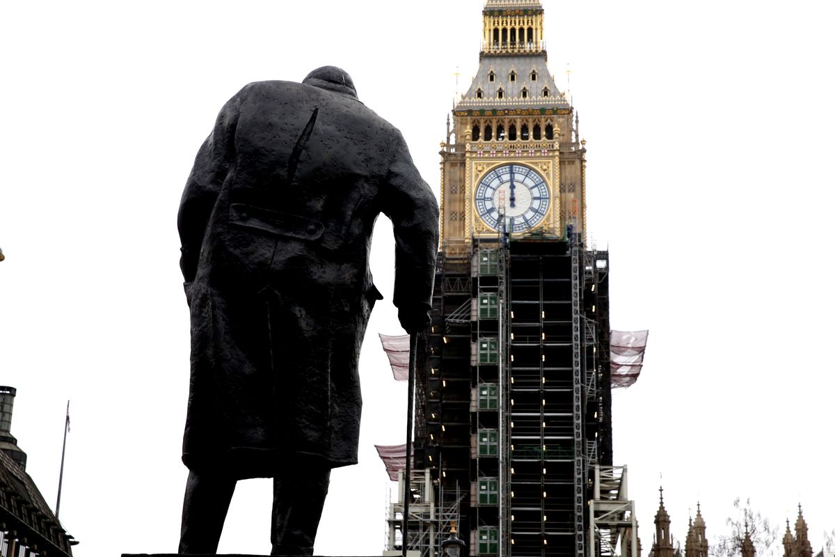 LONDON, ENGLAND - DECEMBER 20: Workers remove sections of scaffolding surrounding Elizabeth Tower, commonly known as Big Ben, as renovation works continue in London, United Kingdom on December 20, 2021. (Photo by Hasan Esen/Anadolu Agency via Getty Images)