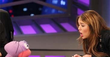 Głupie minki Miley