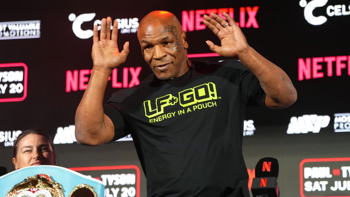 ARLINGTON, TEXAS - MAY 16: Mike Tyson speaks onstage during the Jake Paul vs. Mike Tyson Boxing match Arlington press conference at Texas Live! on May 16, 2024 in Arlington, Texas.  (Photo by Cooper Neill/Getty Images for Netflix)