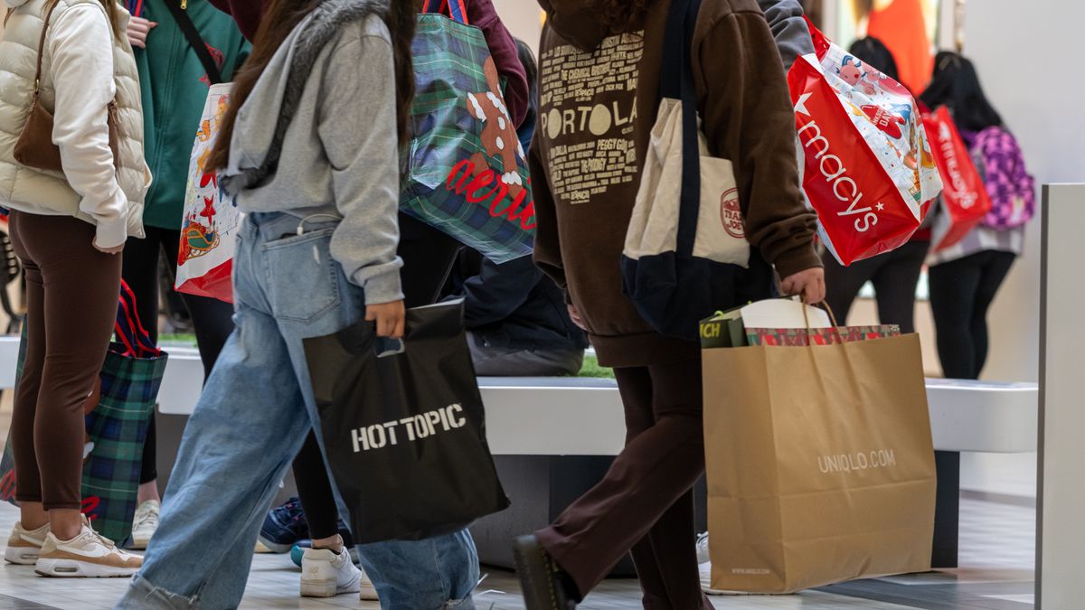 Shoppers inside the Serramonte Mall on Black Friday in Daly City, California, US, on Friday, Nov. 28, 2025. US consumers are heading into the official start of the holiday shopping season Friday with a host of economic concerns, including a cooling job market, stagnant wages, persistent inflation and the looming fallout from tariffs. Photographer: David Paul Morris/Bloomberg via Getty Images
