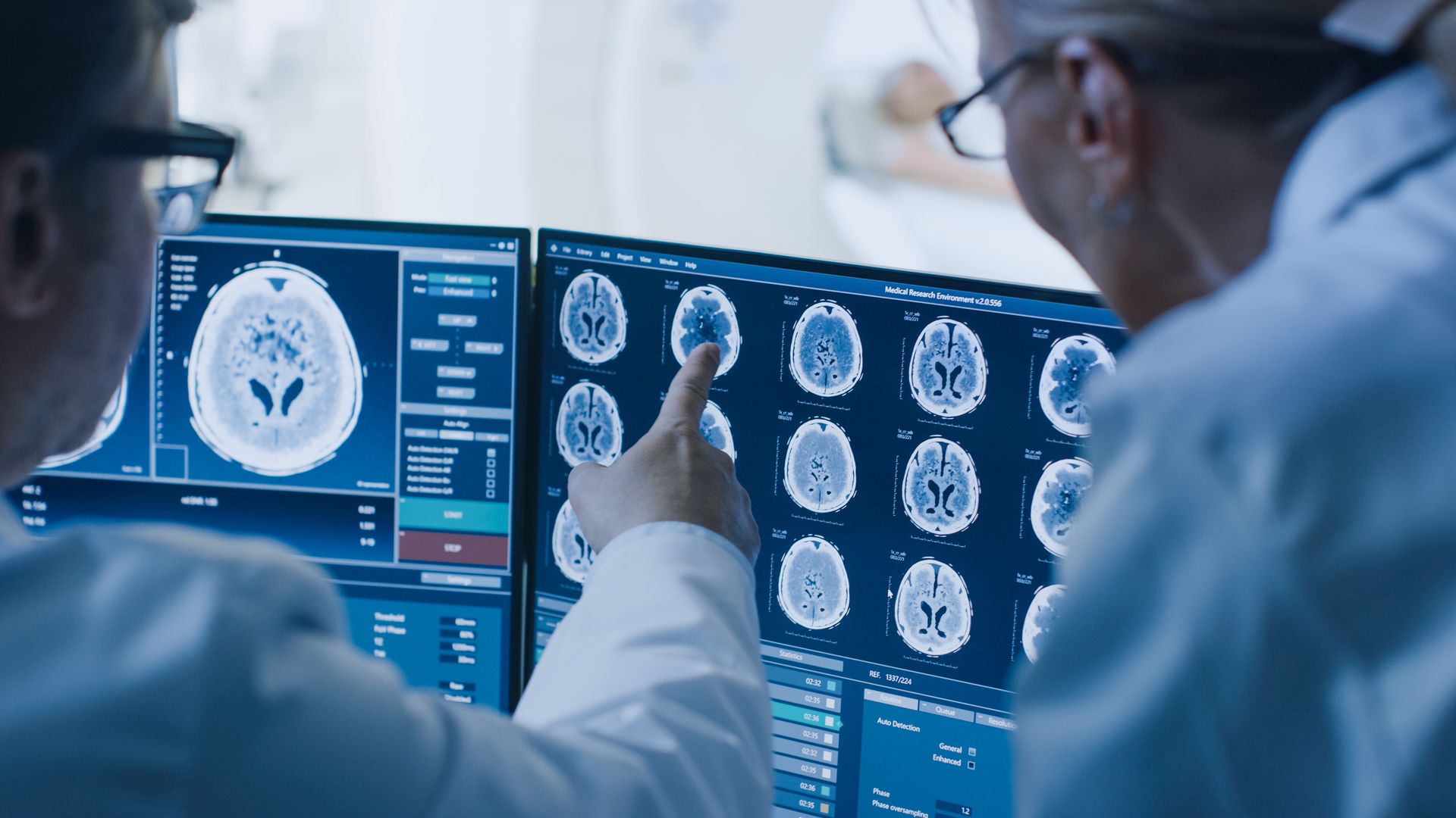hospital, laboratory, lab, facility, modern, clinic, medicine, room, control room, research, x-ray, computed tomography, magnetic resonance imaging, machine, scan, scanner, ct, mri, equipment, people, man, woman, radiologist, doctor, patient, professional, team, technology, oncology, cancer, health care, health, care, science, medical, tumor, diagnosis, computer, image, neurology, radiology, disease, radiotherapy, screen, conversation, talking, examining, monitor, analyzing, brain