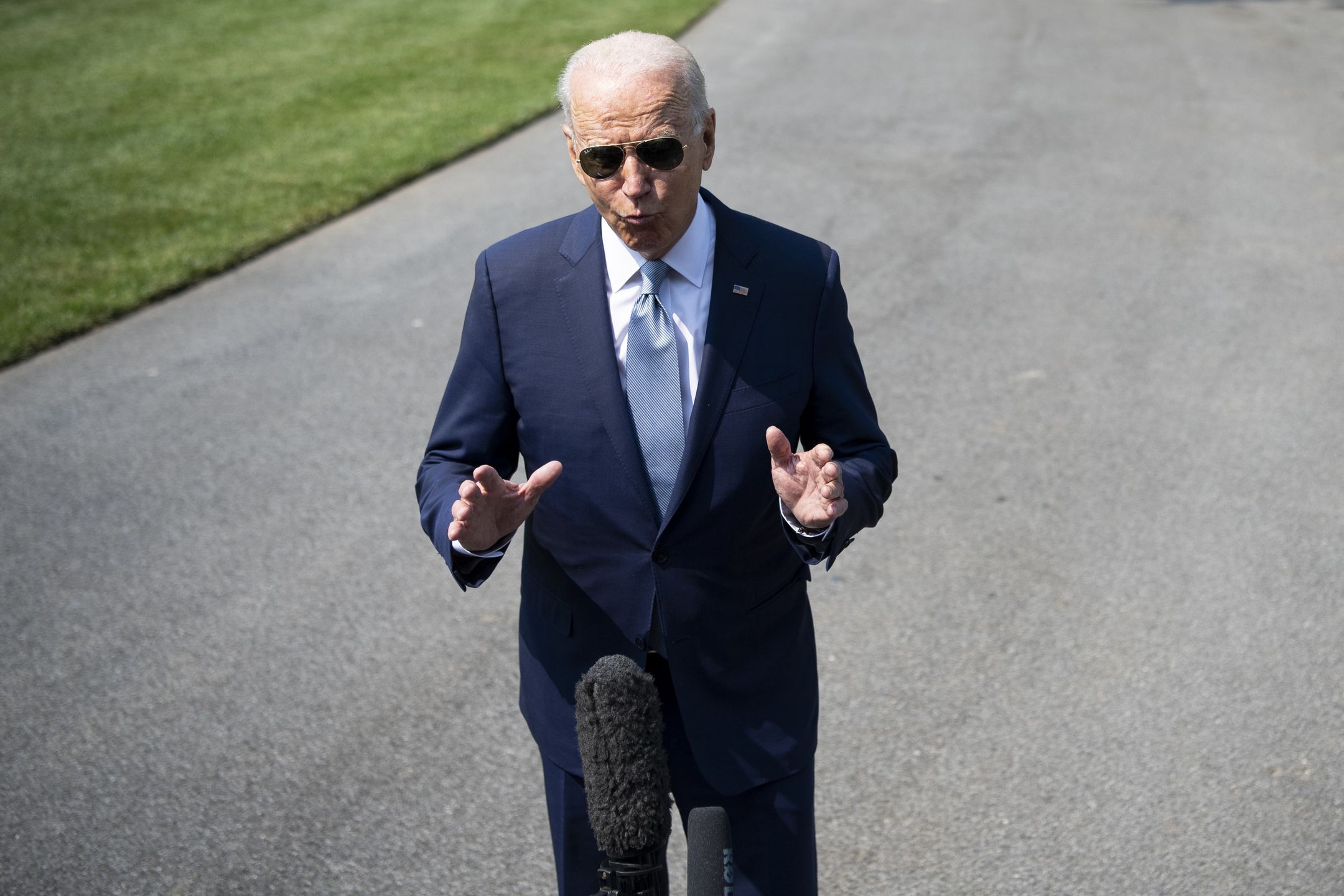 UNITED STATES - JULY 7: President Joe Biden speaks with members of the media on the South Lawn of the White House before boarding Marine One for a trip to Illinois, in Washington on Wednesday, July 7, 2021. (Photo by Caroline Brehman/CQ-Roll Call, Inc via Getty Images)