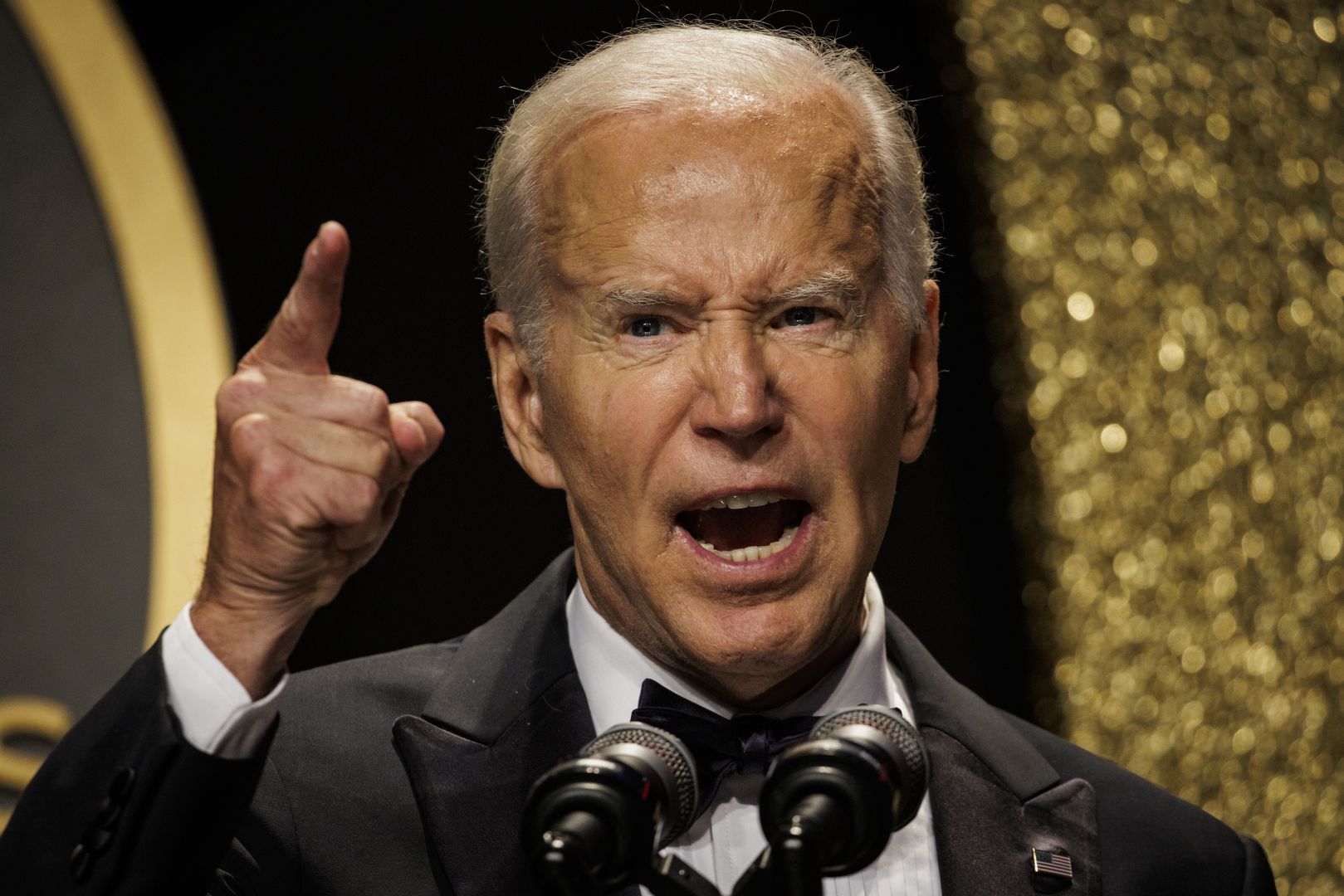 US President Joe Biden speaks at the Phoenix Awards Dinner in Washington, D.C., US, on Saturday, Oct. 1, 2022. The Biden administration this week was accused in a lawsuit by six Republican-led states of overstepping its authority with a plan to forgive federal student loans. Photographer: Samuel Corum/Bloomberg via Getty Images