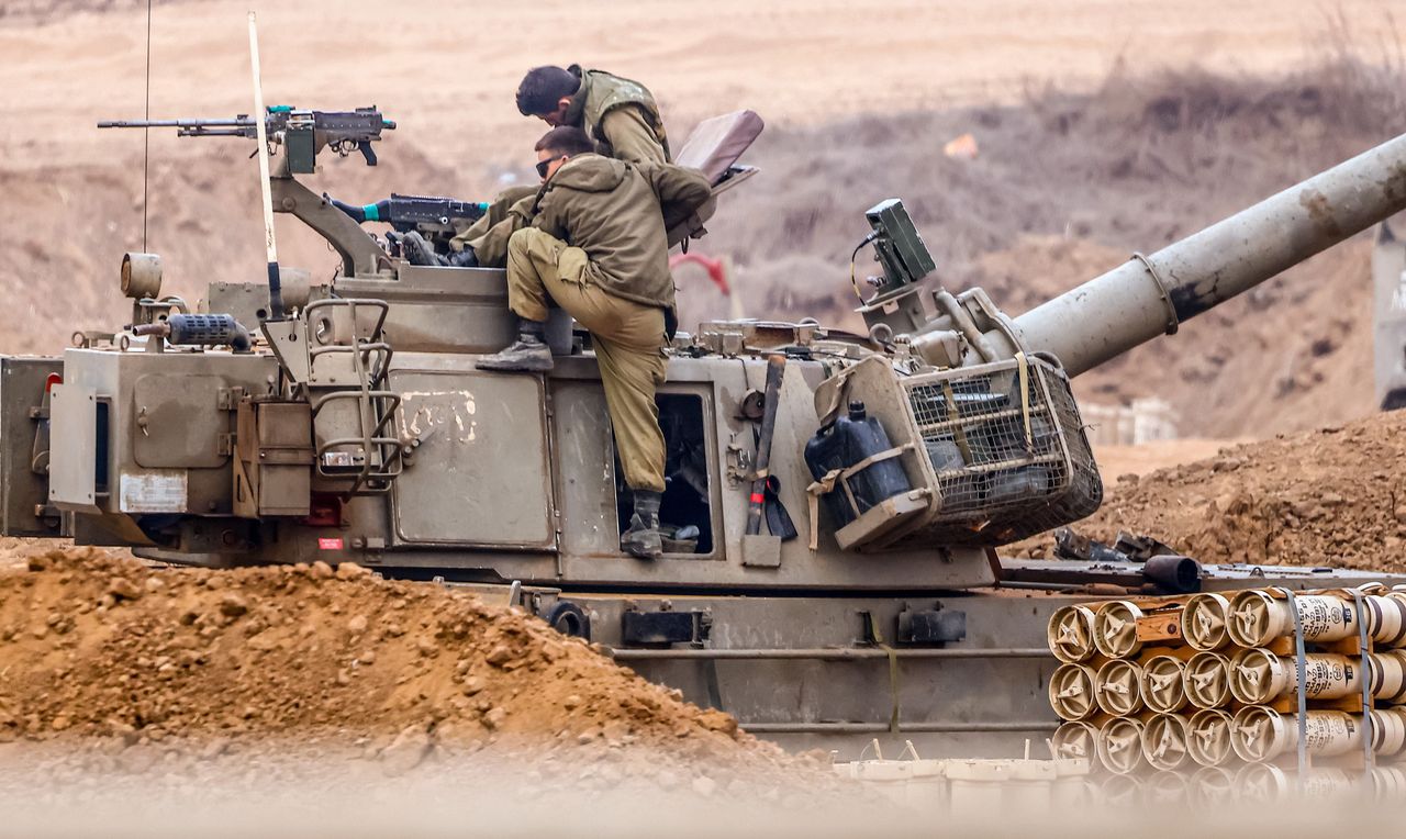 Israeli soldiers prepare for the scenario of ground maneuvers at an undisclosed location near the border with Gaza