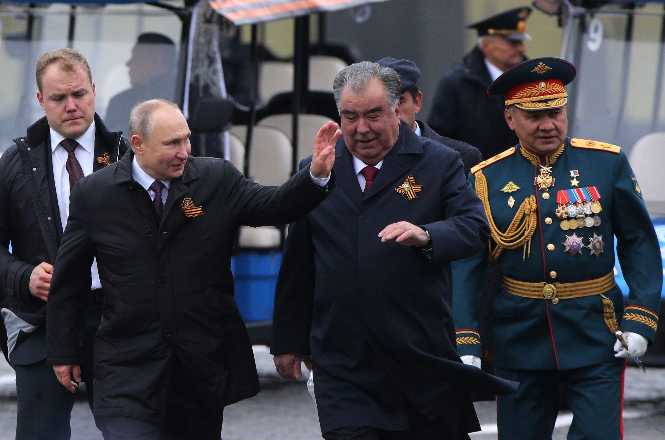 MOSCOW, RUSSIA - MAY 9: (2L-R) Russian President Vladimir Putin, Tajikistan President Emomali Rahmon and Russian defence minister Sergey Shoygu attend a military parade at Red Square on May 9, 2021 in Moscow, Russia. Victory Day is a holiday that commemorates the surrender of Nazi Germany in 1945. (Photo by Mikhail Svetlov/Getty Images)