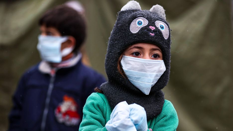 Migrants on Belarusian-Polish borderSergei Bobylevmigrant, refugee, crisis, temporary accommodation, face mask, hat, bia�orusko-polska, granica, kryzys migracyjny, migranci, sytuacja na granicy