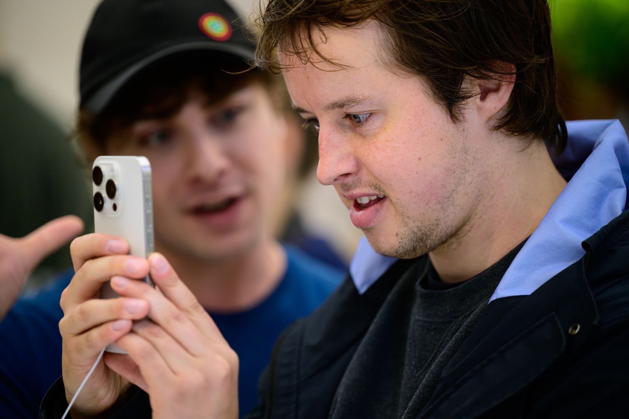 LONDON, ENGLAND - SEPTEMBER 22: Customers test iPhone 15 handsets at the Apple Store on September 22, 2023 in London, England. After Apple's announcement of the iPhone 15 series on September 12, including the iPhone 15, iPhone 15 Plus, iPhone 15 Pro, and iPhone 15 Pro Max, the highly anticipated lineup is now available for in-store pickup starting today. (Photo by Leon Neal/Getty Images)