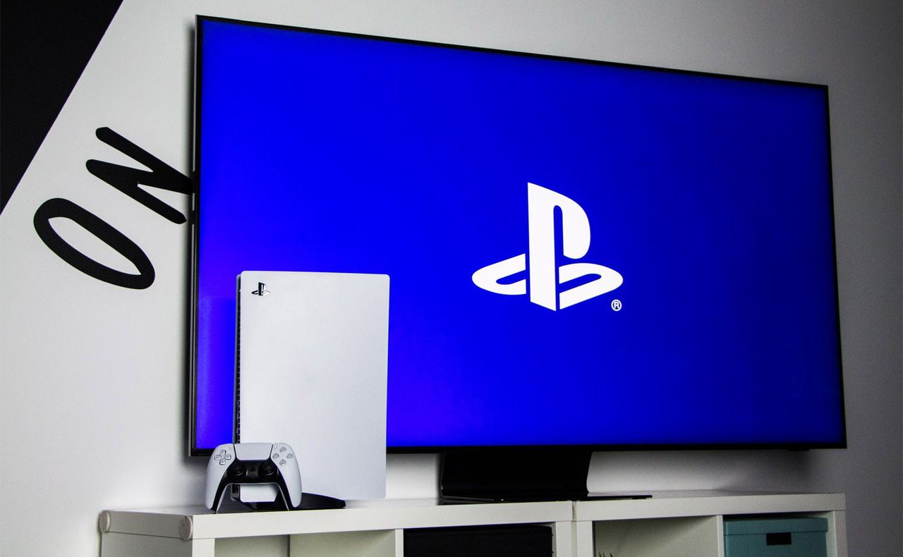 A TV with a Sony PS5 console