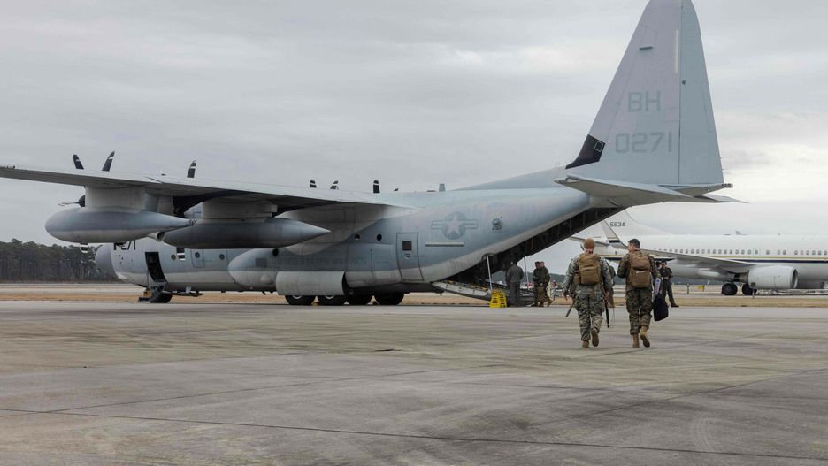 Temporary
This image obtained from the US Department of Defense shows US Marines boarding a KC-130J Super Hercules at Marine Corps Air Station Cherry Point, North Carolina, on February 2, 2025, as they deploy to Naval Station Guantanamo Bay in Cuba to support Migrant Holding Operations. US President Donald Trump has said he wants to send 30,000 "criminal illegal aliens" to the notorious Guantanamo Bay US military base in Cuba. Trump said this week he had ordered the construction of a detention center there to "double our capacity immediately" to hold undocumented migrants. (Photo by Orlanys Diaz Figueroa / US Department of Defense / AFP) / RESTRICTED TO EDITORIAL USE - MANDATORY CREDIT "AFP PHOTO / US Departnment of Defense/US Marine Corps Lance Cpl. Orlanys Diaz Figueroa  " - NO MARKETING NO ADVERTISING CAMPAIGNS - DISTRIBUTED AS A SERVICE TO CLIENTS
ORLANYS DIAZ FIGUEROA