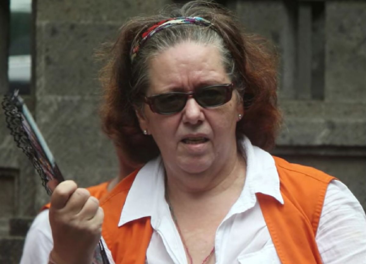 The 67-year-old woman notes that she did it because her children were threatened.