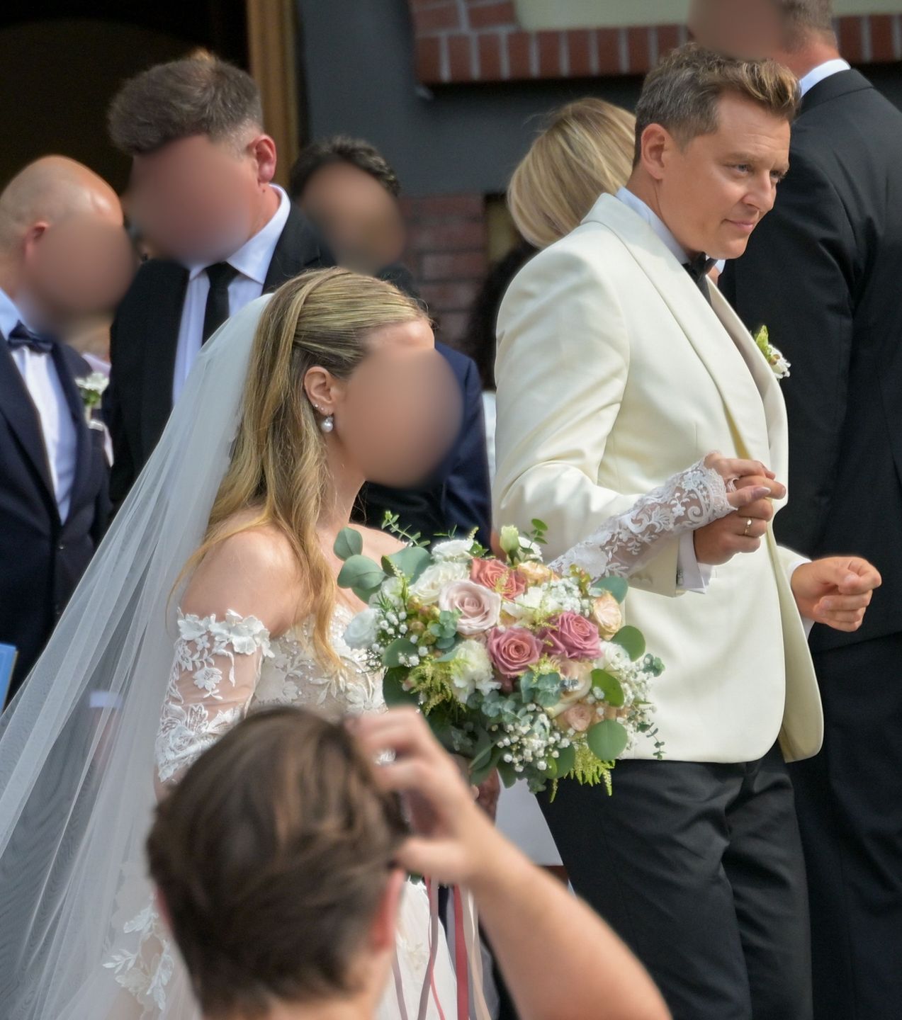 Rafał Brzozowski z żoną po ślubie