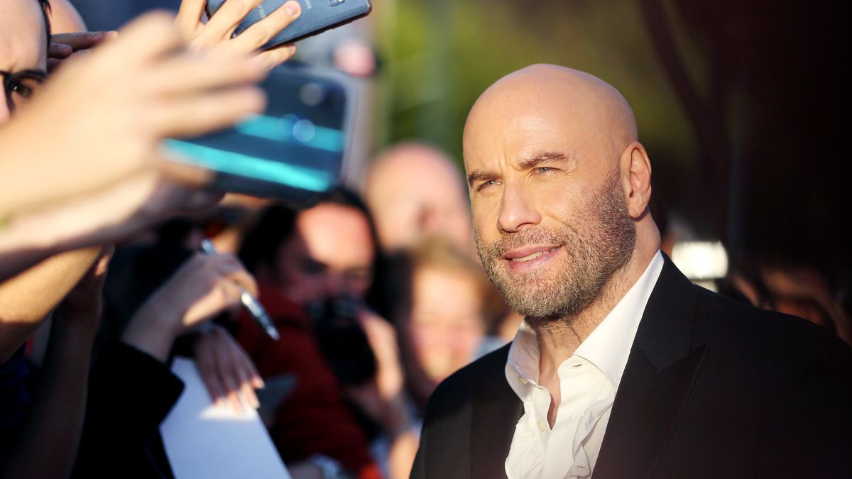 ROME, ITALY - OCTOBER 22: John Travolta takes selfies with fans on the red carpet during the 14th Rome Film Festival on October 22, 2019 in Rome, Italy. (Photo by Ernesto S. Ruscio/Getty Images for RFF)