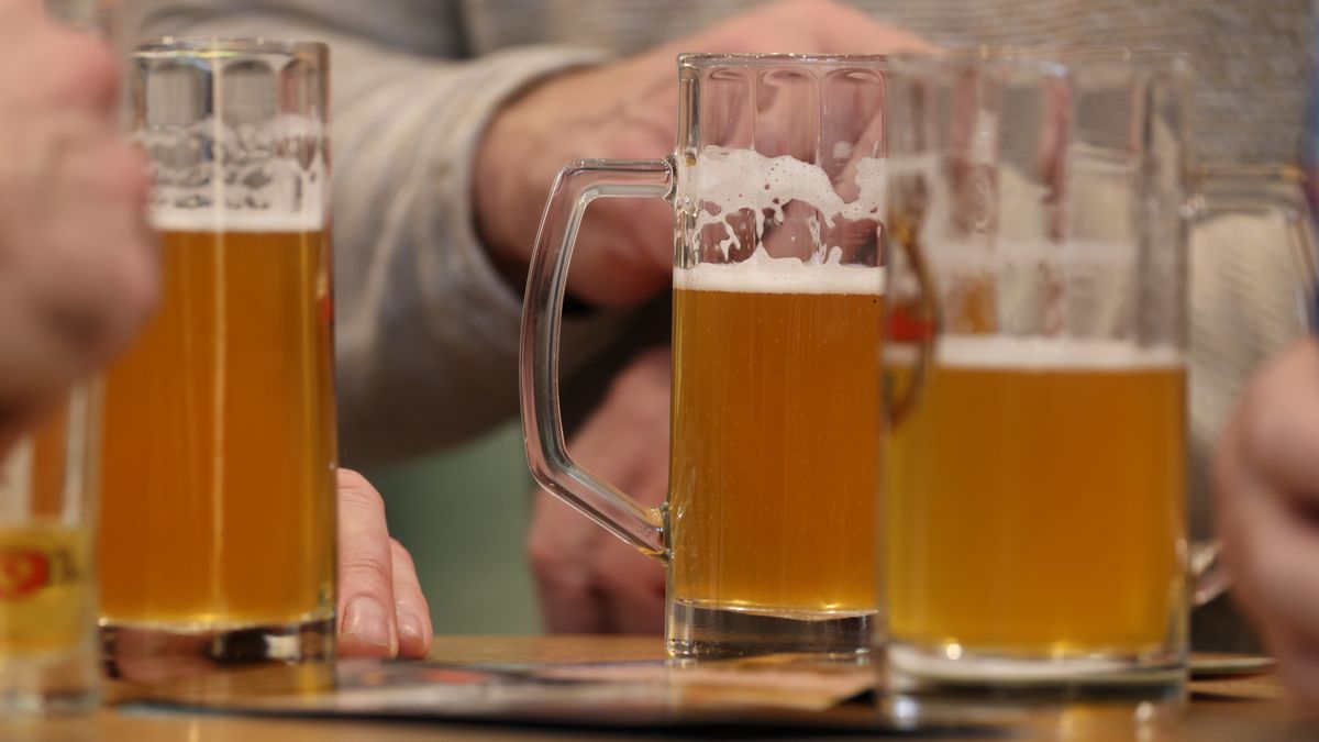 BERLIN, GERMANY - JANUARY 20: Visitors drink beer at the Green Week (Grüne Woche) agricultural fair on January 20, 2025 in Berlin, Germany. The fair is taking place following a recent outbreak of foot and mouth disease at an organic farm outside Berlin late last week. It seems to have since been successfully contained, though several countries, including the United Kingdom and South Korea, are temporarily banning the import of German meat. (Photo by Sean Gallup/Getty Images)