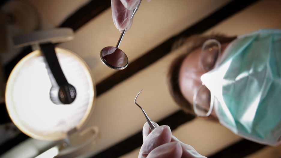 Dentists Offering NHS Treatment Continue To Dwindle
GREAT BOOKHAM, UNITED KINGDOM - APRIL 19:  A patients eye view, as a dentist poses for the photographer on April 19, 2006 in Great Bookham, England.  (Photo by Peter Macdiarmid/Getty Images)
Peter Macdiarmid
EOS1DMkII-237761, dental, teeth, health, treatment, patient, examination, 57366402