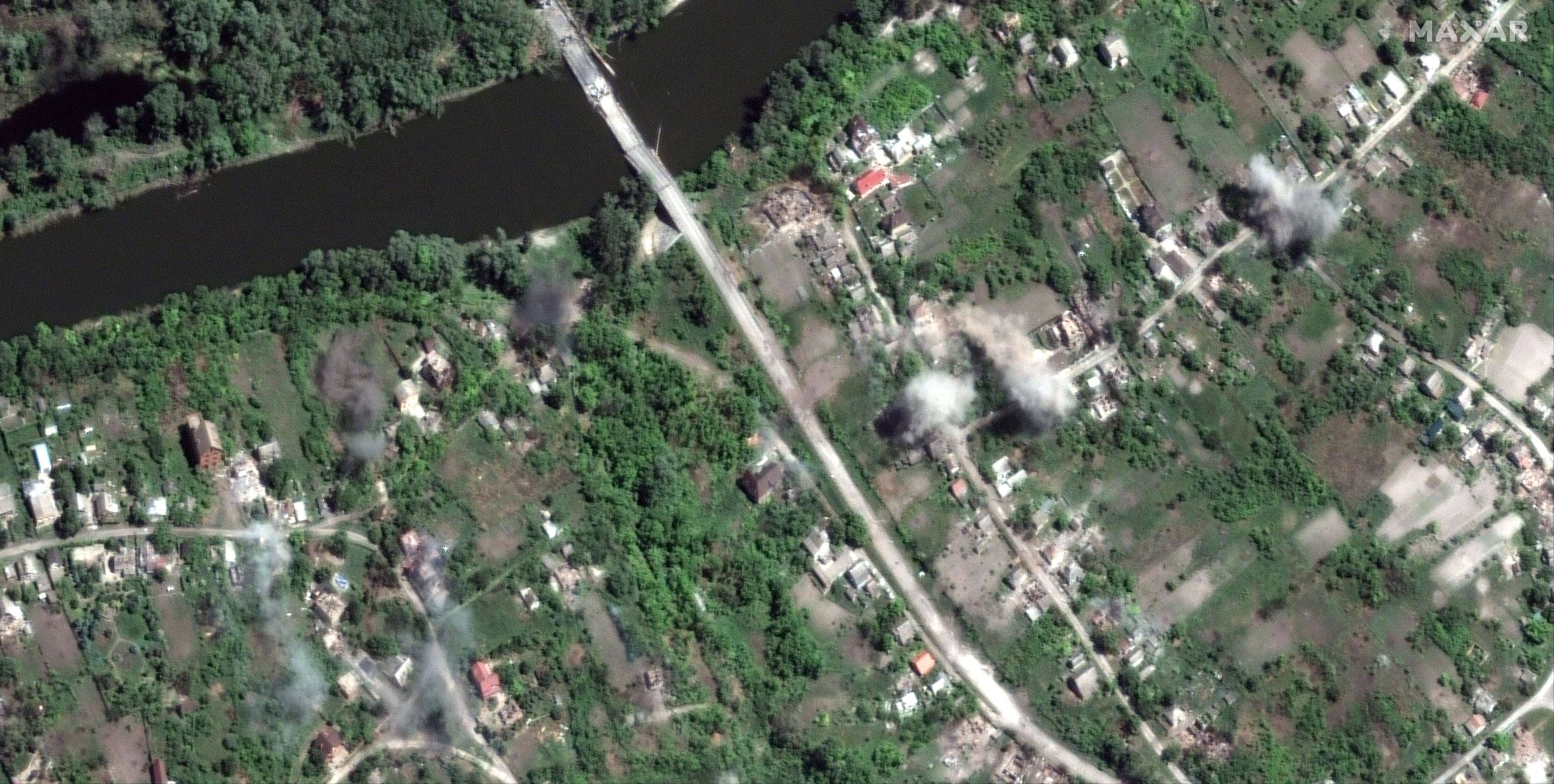 Satellite imagery of eastern Ukraine: widespread artillery attacks continueepa10000650 A handout satellite image made available by Maxar Technologies shows additional artillery explosions along Siverskyi Donets River and town of Bogorodichne, Ukraine, 06 June 2022 (issued 07 June 2022). Maxar collected new satellite imagery that claims to show nearly continuous and relentless bombardment and artillery shelling of villages and cities in eastern Ukraine as Russian forces attempt to gain control of the Luhansk and Donetsk Oblasts. On 24 February, Russian troops invaded Ukrainian territory starting a conflict that has provoked destruction and a humanitarian crisis. According to the UNHCR, more than 6.9 million refugees have fled Ukraine, and a further 7.7 million people have been displaced internally within Ukraine since.  EPA/MAXAR TECHNOLOGIES HANDOUT -- MANDATORY CREDIT: SATELLITE IMAGE 2022 MAXAR TECHNOLOGIES -- THE WATERMARK MAY NOT BE REMOVED/CROPPED -- HANDOUT EDITORIAL USE ONLY/NO SALES Dostawca: PAP/EPA.MAXAR TECHNOLOGIES HANDOUT
