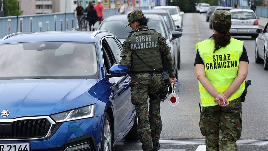 Poland Introduces Controls At Germany Border
SLUBICE, LUBUSKIE, POLAND - JULY 07: Polish border police monitor vehicles arriving from Germany at the border crossing on July 07, 2025 in Slubice, Poland. Poland is launching controls at its busiest border crossings to Germany in what the government claims is an effort to prevent undocumented migrants who have been turned away by German authorities from returning to Poland. Germany has stepped up its own controls at all border crossings in an effort to stem illegal immigration. (Photo by Sean Gallup/Getty Images)
Sean Gallup