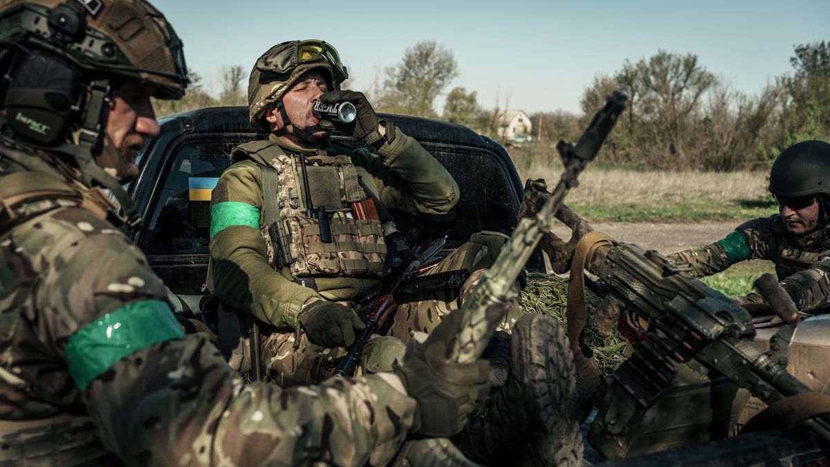 KHARKIV OBLAST, UKRAINE - APRIL 28: Ukrainian soldier in accouterments drinks an energy drink sitting with fellows in a vehicle with weapon in position on April 28, 2022 in Kharkiv Oblast, Ukraine. Barvinkove is a city located in the Izium district, where some of the fiercest fighting in eastern Ukraine is currently taking place. According to the General Staff of the Ukrainian Armed Forces, the Ukrainian army continue to repel attacks on the town, as Russian troops look to advance in eastern and southern Ukraine with the aim of gaining control of Donetsk and Luhansk Oblast and to maintain a land corridor to Crimea. Russia launched a large-scale invasion of Ukraine on February 24, 2022, triggering the largest military attack in Europe since World War II. (Photo by Serhii Mykhalchuk/Global Images Ukraine via Getty Images)
Global Images Ukraine