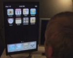 iPhone na 24-calowym ekranie