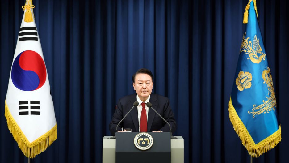 South Korea's president declares martial law
epa11754494 A handout picture made available by South Korea's President Office shows South Korean President Yoon Suk Yeol declaring martial law in a televised emergency address delivered from the presidential office in Seoul, South Korea, 03 December 2024. The head of state addressed the nation citing the need to root out pro-North Korean forces and uphold the constitutional order.  EPA/SOUTH KOREA PRESIDENT OFFICE / YONHAP / HANDOUT SOUTH KOREA OUT - BEST QUALITY AVAILABLE / HANDOUT EDITORIAL USE ONLY/NO SALES 
Dostawca: PAP/EPA.
SOUTH KOREA PRESIDENT OFFICE / YONHAP / HANDOUT
martial, law, president, rok, korea, head, of, state