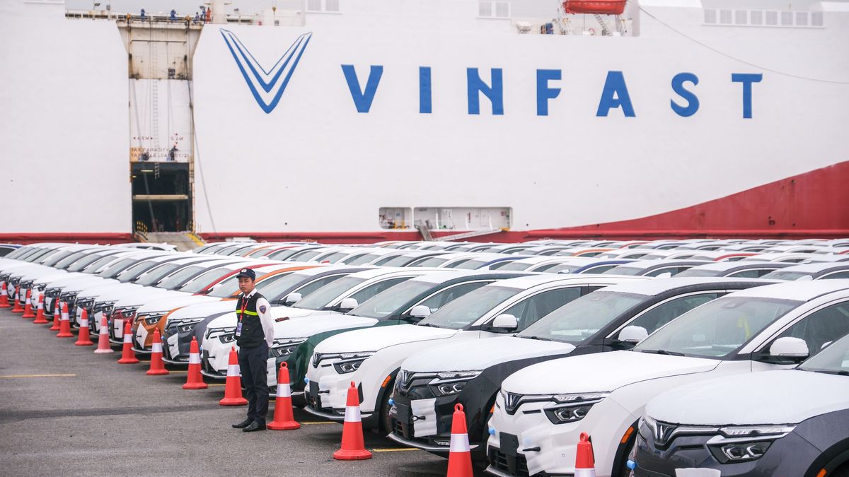 VinFast LLC's EV VF8 vehicles bound for shipment at the port in Haiphong, Vietnam, on Friday, Nov. 25, 2022. VinFast, which said in July that it had signed agreements with banks to raise at least $4 billion to help its US expansion, has about 73,000 global reservations for its EVs, according to the company. It has secured about $1.2 billion in incentives for its planned EV factory in North Carolina, where it intends to start production in 2024, according to the auto manufacturer.  Photographer: Linh Pham/Bloomberg via Getty Images