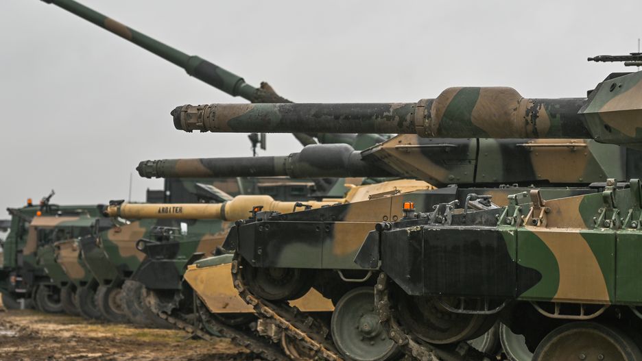 The US Abrams tanks, the German Leopard and the AHS Krab, a 155 mm NATO-compatible self-propelled tracked gun-howitzer seen at the training ground in Nowa Deba on September 21, 2022, in Nowa Deba, Subcarpathian Voivodeship, Poland.
Soldiers from Poland, the USA and Great Britain take part in the joint military exercise 'BEAR 22' (Polish: Niedzwiedz 22') in the Eastern Poland. (Photo by Artur Widak/NurPhoto via Getty Images)