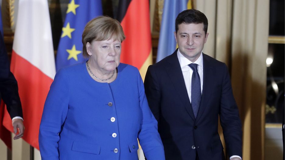 PARIS, FRANCE  DECEMBER 9, 2019: Germany's Chancellor Angela Merkel (L), and Ukraine's President Volodymyr Zelenskyy (Vladimir Zelensky) attend a Normandy Four summit in the Murat Lounge in the Elysee Palace; talks in the so-called Normandy Four format involve representatives of Ukraine, Germany, France and Russia who discuss settlement of the conflict in eastern Ukraine. Mikhail Metzel/TASS (Photo by Mikhail Metzel\TASS via Getty Images)