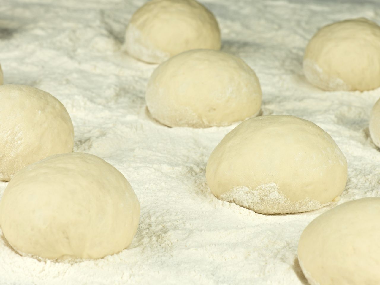 Place the fork on the rising yeast rolls.