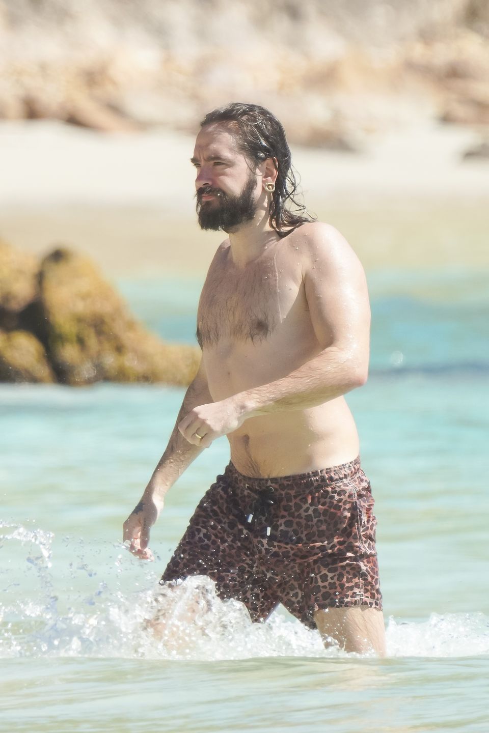 Heidi Klum hasa z mężem na plaży