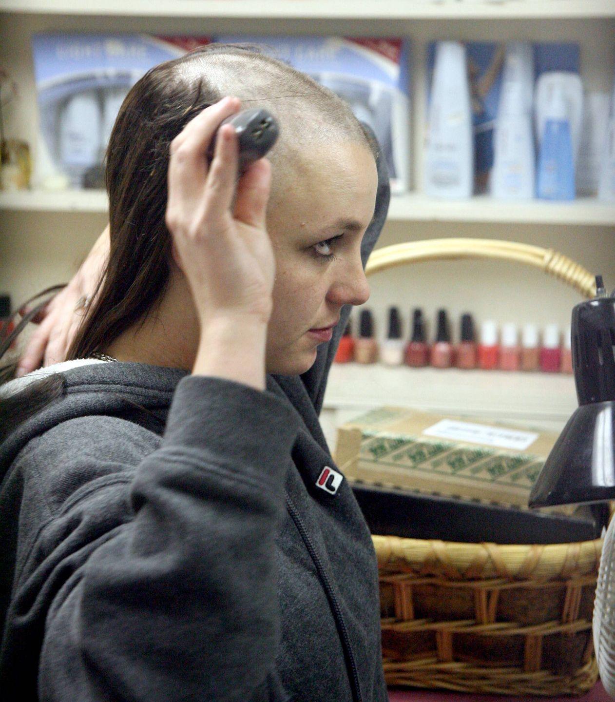 Britney shaves her headBritney Spears shaves her head and gets two tattoos Feb 16, 2007  exclusive,Image: 20252963, License: Rights-managed, Restrictions: , Model Release: no, Credit line: MBF/X17online.com / X17 / ForumMBF/X17online.com / X17 / Forumcelebrity set, gossip, fashion police, half length, flub, contretemps, faux pas, grey sweater, grey jumper, grey pullover, brunette, dark-haired, long hair, bald, hairless, asdfg