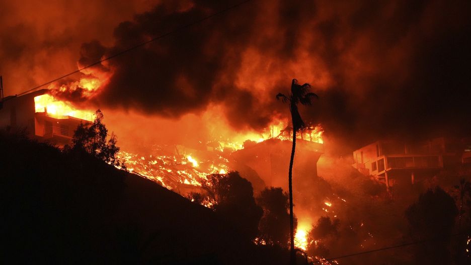 Temporary
The Palisades Fire burns homes on a hilltop in the Pacific Palisades neighborhood of Los Angeles, Wednesday, Jan. 8, 2025. (AP Photo/Mark J. Terrill)
Mark J. Terrill