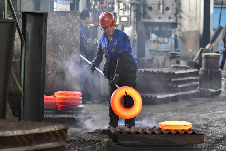 A worker works at an auto gear manufacturing company in Qingzhou Economic Development Zone in Qingzhou, China, on September 30, 2024. On the same day, the Service Industry Survey Center of the National Bureau of Statistics and the China Federation of Logistics and Purchasing release data showing that the manufacturing purchasing managers index (PMI) is 49.8% in September 2024, up 0.7 percentage points from the previous month. (Photo by Costfoto/NurPhoto via Getty Images)