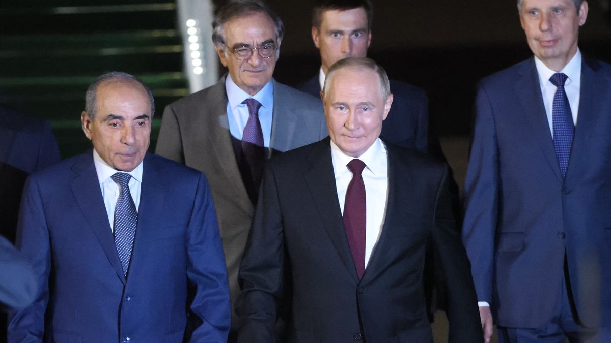 BAKU, AZERBAIJAN - AUGUST 18 (RUSSIA OUT) Russian President Vladimir Putin (C), followed by Azeri First Deputy Prime Minister Yaqub Eyyubov (L) smile during his arrival to Baku's airport, August 18, 2024, in Baku, Azerbaijan. Putin is having a two-days official visit to Azerbaijan. (Photo by Contributor/Getty Images)