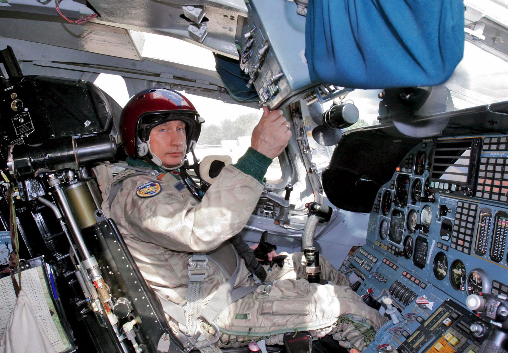 RUSSIA PUTIN ATTENDS AIF FORCE EXERCISESepa000505089 Russian President and commander in chief Vladimir Putin sits on a pilot's seat inside the Tu-160 strategic bomber jet at the Moscow's Chkalovsky military airport, Tuesday 16 August 2005. Vladimir Putin has flown to the area of exercises for the national strategic air force and Northern Fleet aboard a Tu-160 strategic bomber.  EPA/PRESIDENTIAL PRESS SERVICE/ITAR-TASS POOL POOLPRESIDENTIAL PRESS SERVICE/ITAR-TASS POOL