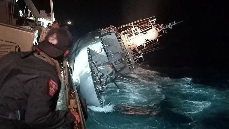 Temporary
This handout photo taken on December 18, 2022 and released on December 19 by the Royal Thai Navy shows the HTMS Sukhotha warship on its side before sinking in the Gulf of Thailand, off the coast of Bangsaphan district in Prachuab Kiri Khan province. - At least 31 Royal Thai navy personnel were missing at sea after a vessel floundered off in the Gulf of Thailand, a spokesperson said December 19. (Photo by Handout / ROYAL THAI NAVY / AFP) / -----EDITORS NOTE --- RESTRICTED TO EDITORIAL USE - MANDATORY CREDIT "AFP PHOTO / ROYAL THAI NAVY" - NO MARKETING - NO ADVERTISING CAMPAIGNS - DISTRIBUTED AS A SERVICE TO CLIENTS  -
HANDOUT