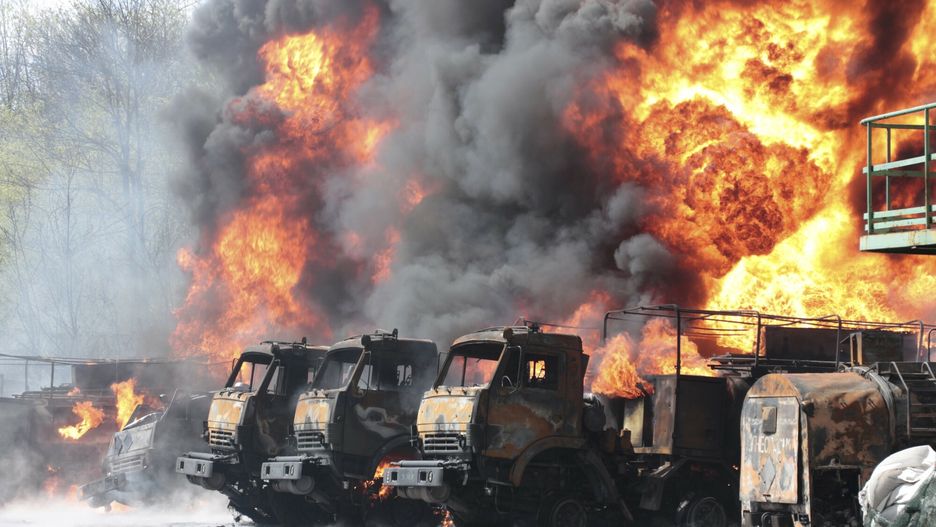 TemporaryVehicles are on fire at an oil depot after missiles struck the facility in an area controlled by Russian-backed separatist forces in Makiivka, east of Donetsk, eastern Ukraine, Wednesday, May 4, 2022. (AP Photo)AP