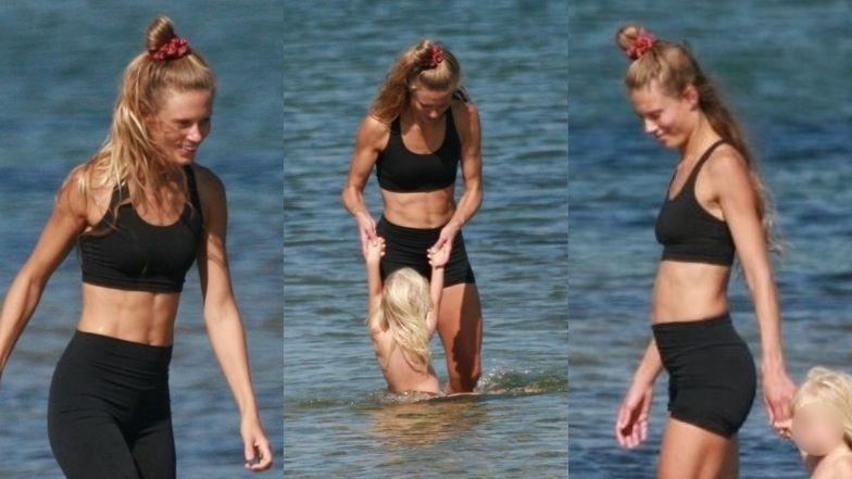 Julia Pietrucha dokazuje z córką na plaży