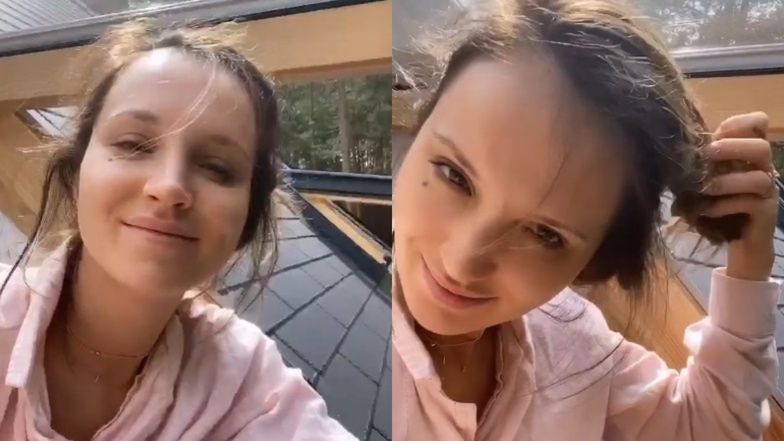 Marina zachwyca się porankiem w lesie