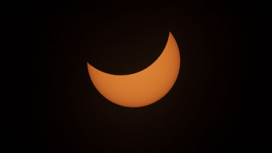RUSSELLVILLE, ARK. - APRIL 8, 2024:   The total solar eclipse lasted 2 hours andc38 minutes with 4 minutes at 12 seconds of totality during the  Moon over Main Street Solar Eclipse Festival in Russellville, Ark., on April 8, 2024. (Photo by Jonathan Newton/For The Washington Post via Getty Images)